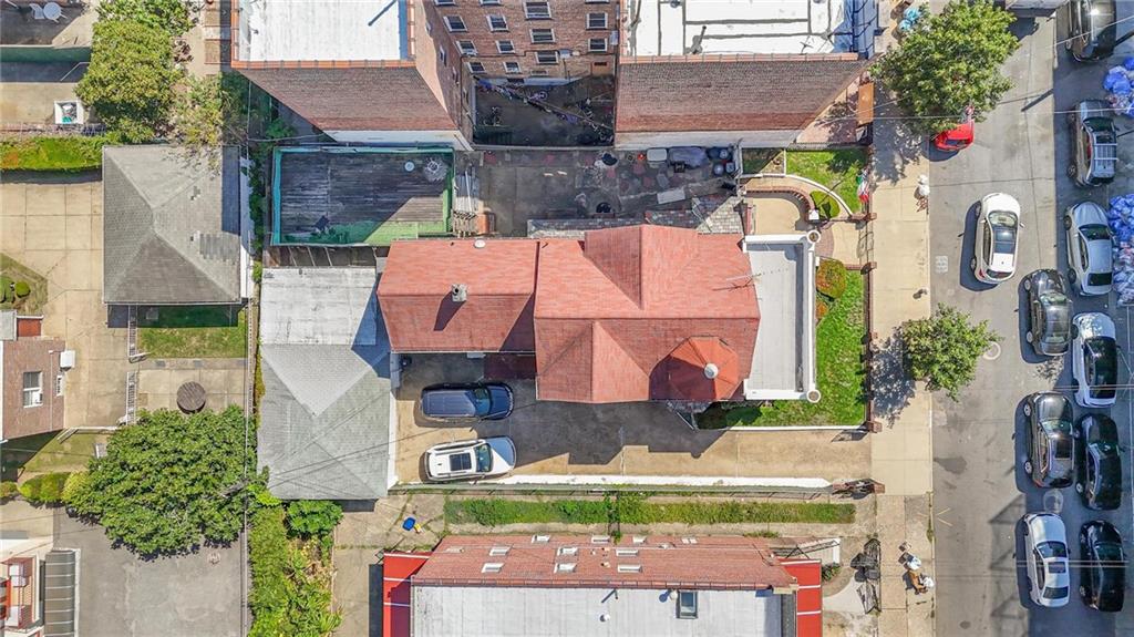 2219 83rd Street Brooklyn, NY 11214 - Photo 3 of 25 an aerial view of residential houses with outdoor space