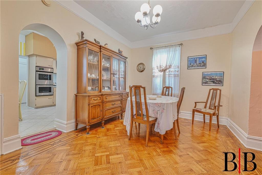 2219 83rd Street Brooklyn, NY 11214 - Photo 6 of 25 a view of a dining room with furniture