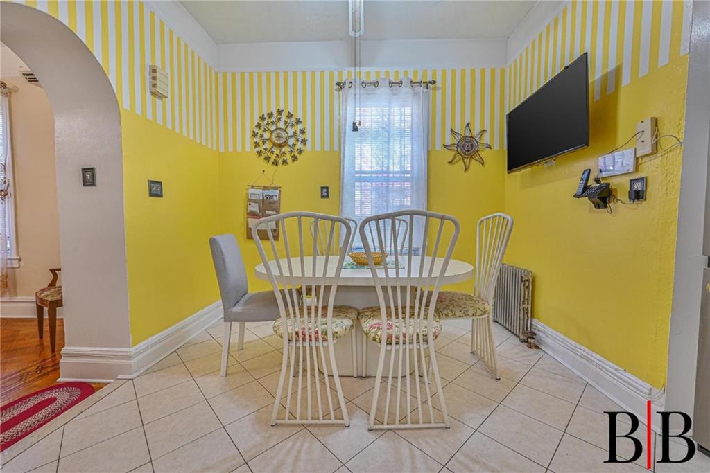 2219 83rd Street Brooklyn, NY 11214 - Photo 8 of 25 a view of a dining room with furniture