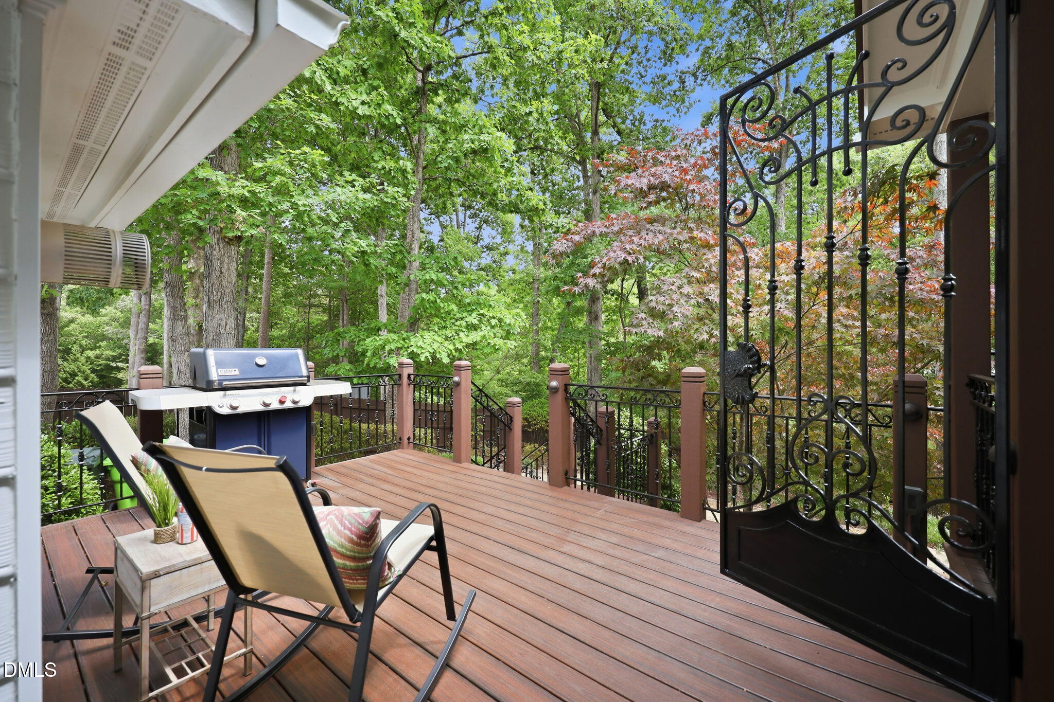 1716 Farmington Grove Drive Raleigh, NC 27614 - Photo 32 of 41 a view of a patio with table and chairs and wooden floor