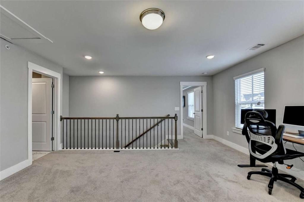 1714 Prospect Way Conyers, GA 30094 - Photo 16 of 35 a view of a room with gym equipment