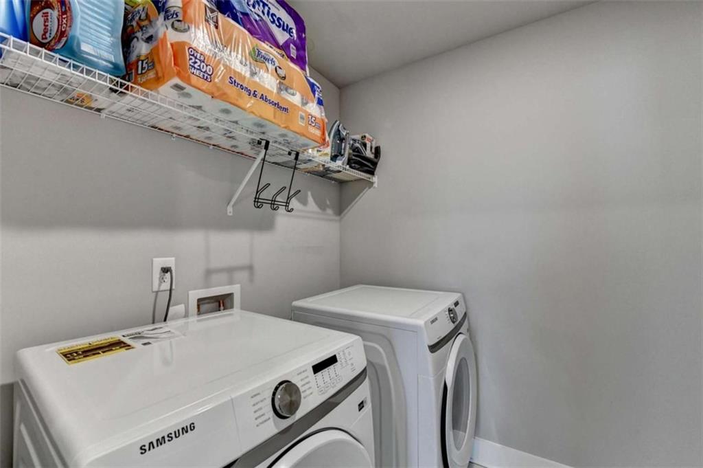 1714 Prospect Way Conyers, GA 30094 - Photo 23 of 35 a utility room with dryer and washer