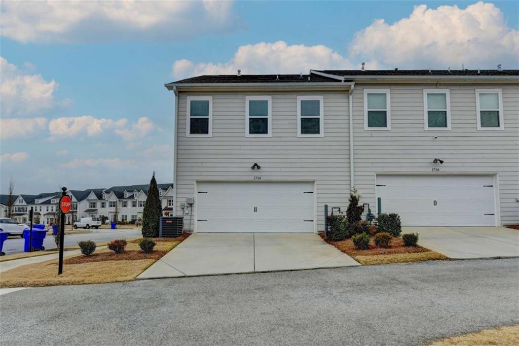 1714 Prospect Way Conyers, GA 30094 - Photo 33 of 35 a view of a house with a garage
