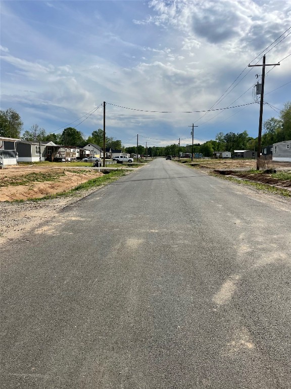 290 Road 373-01 Splendora, TX 77372 - Photo 15 of 17 a view of a street with houses