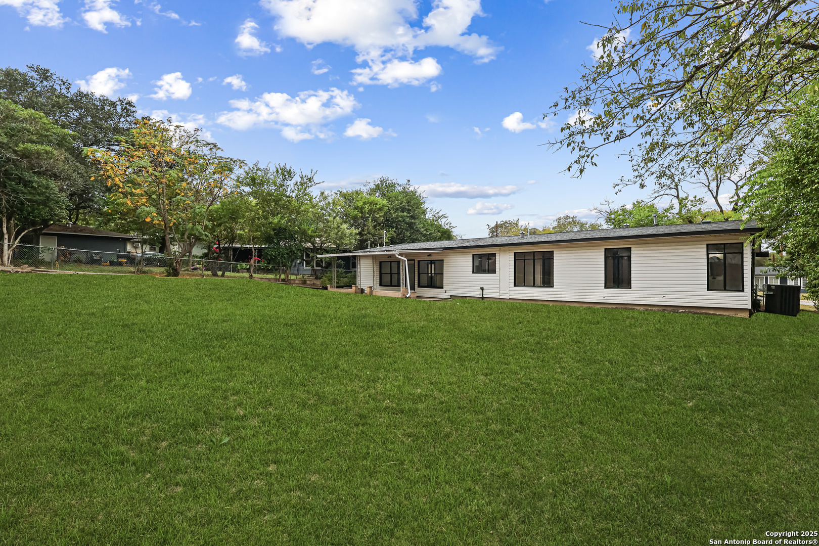 728 Rittiman Road San Antonio, TX 78209 - Photo 29 of 31 a front view of house with a garden