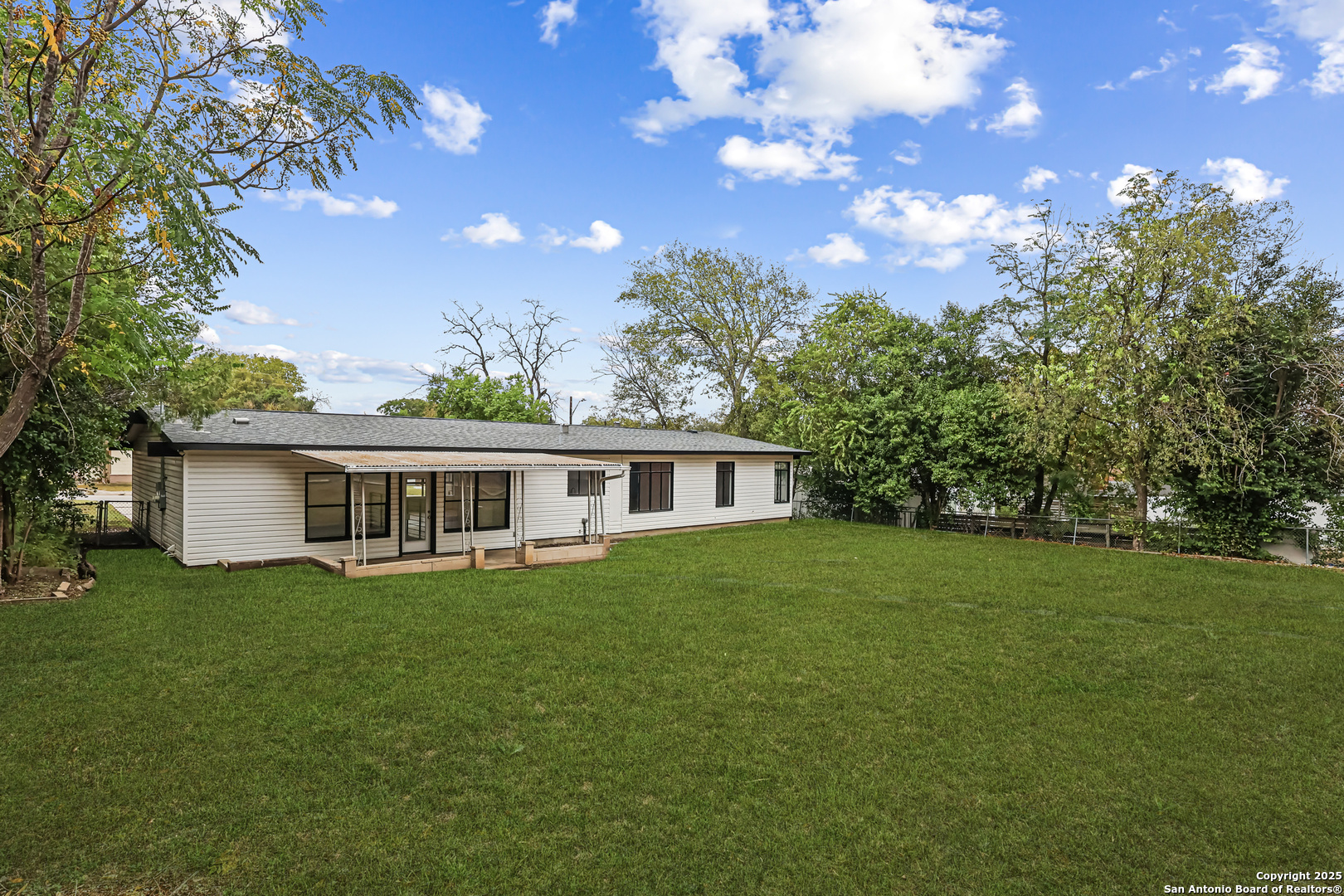 728 Rittiman Road San Antonio, TX 78209 - Photo 30 of 31 a view of a house with a backyard