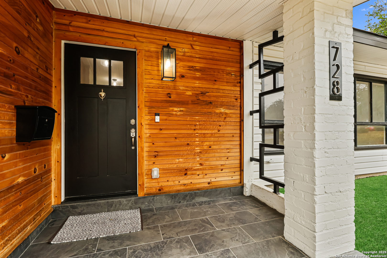 728 Rittiman Road San Antonio, TX 78209 - Photo 3 of 31 a view of a wooden door of the house