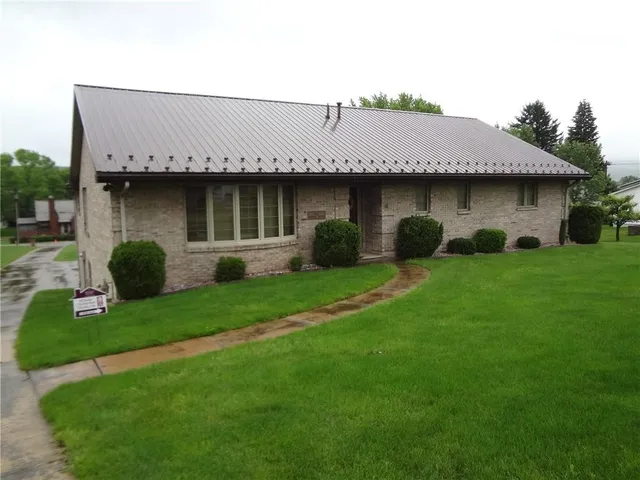 a kitchen with a cabinets and window