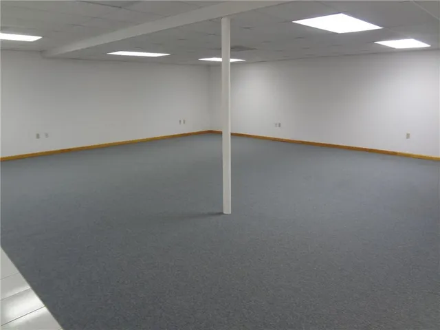 a kitchen with cabinets a sink and a stove