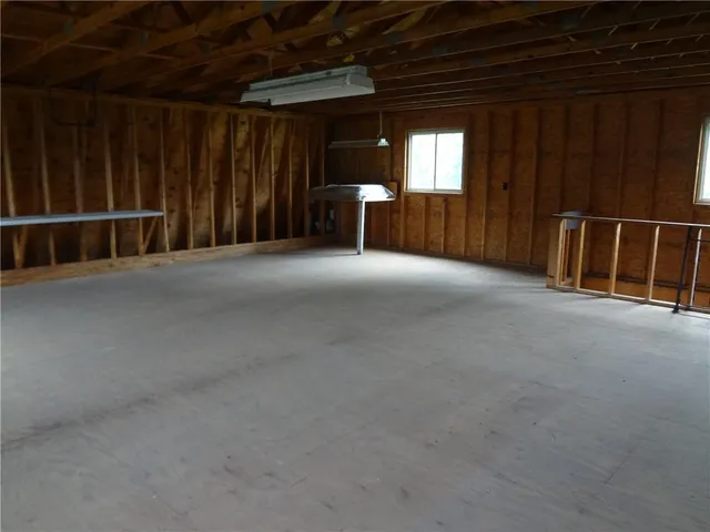 a view of a windows and a fireplace in a room