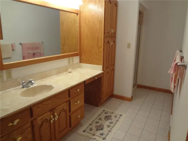 an empty room with closet area