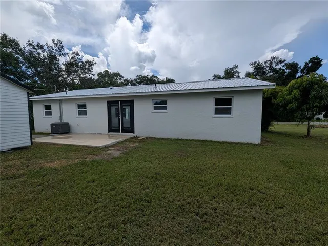 a view of a backyard with a garden