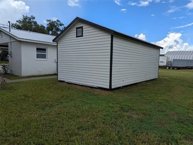 a view of a trees with a big yard