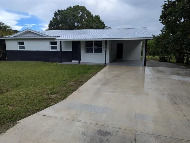 front view of house with a yard