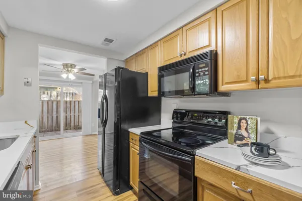 a kitchen with a stove and a microwave
