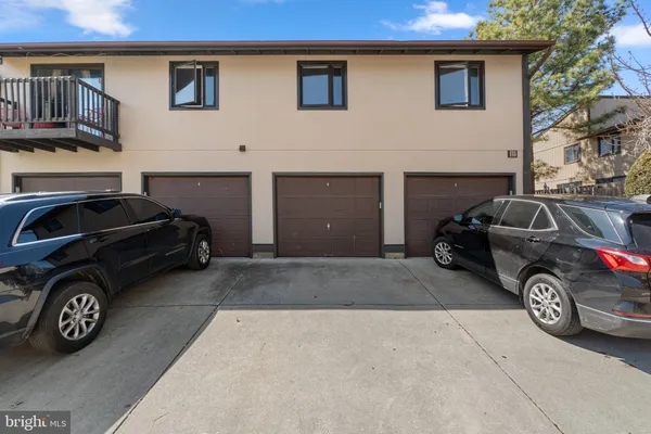 a car parked in front of a house