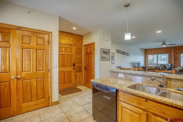 a view of a kitchen counter space and windows