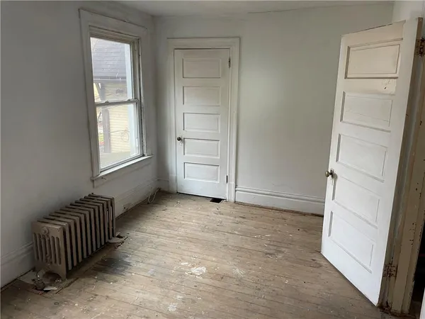 an empty room with windows