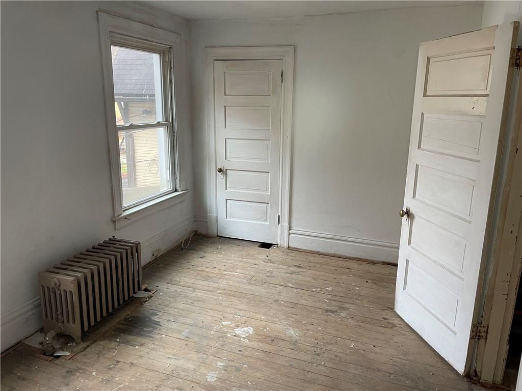 419 Robinson Street Pitcairn, PA 15140 - Photo 7 of 14 an empty room with windows