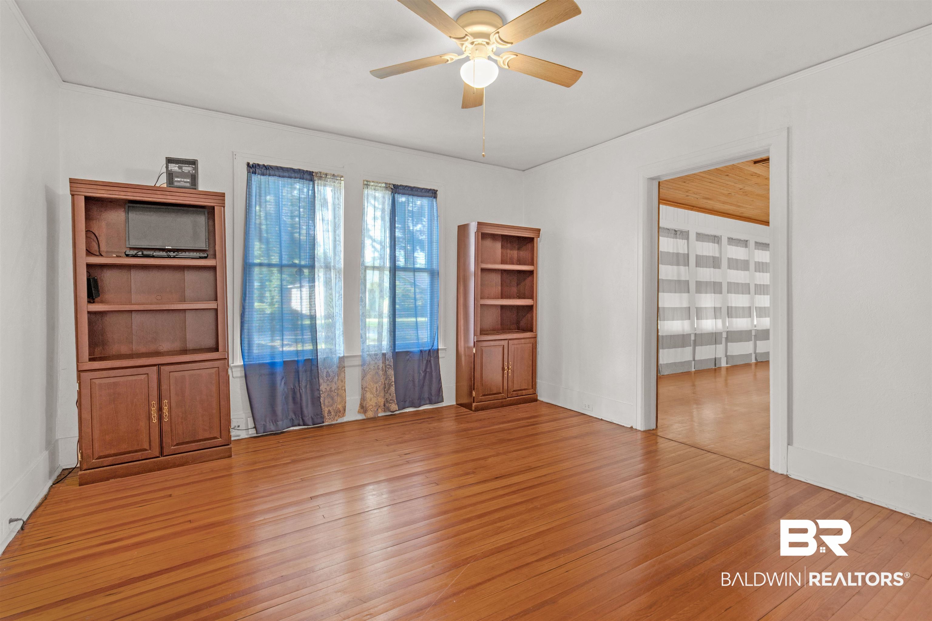 4306 Stein Street Mobile, AL 36608 - Photo 12 of 30 Empty room with ceiling fan and light hardwood / wood-style flooring