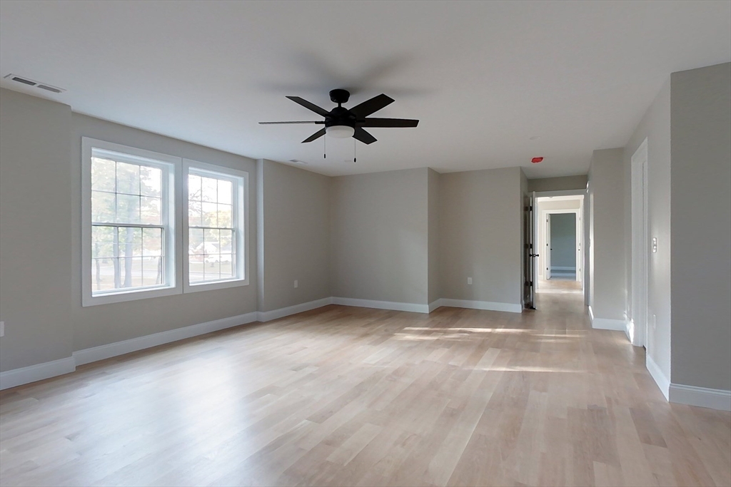 129 Lowell Road Pepperell, MA 01463 - Photo 17 of 39 a view of n empty room with a window