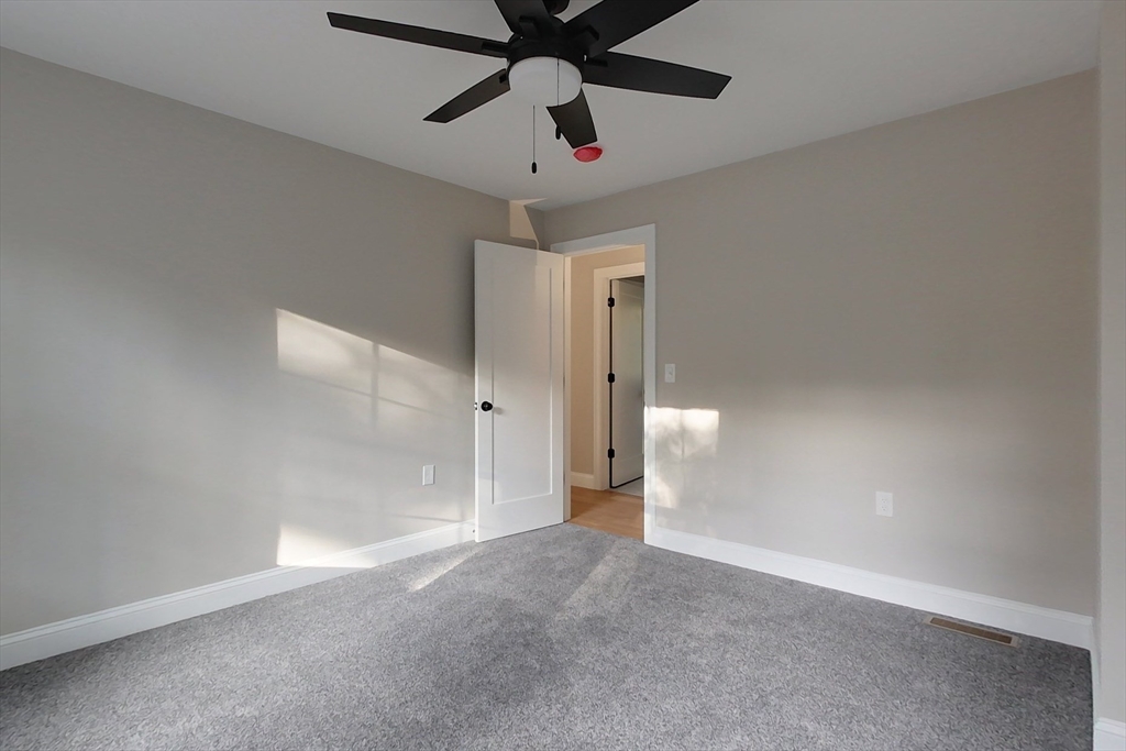 129 Lowell Road Pepperell, MA 01463 - Photo 25 of 39 a view of an empty room