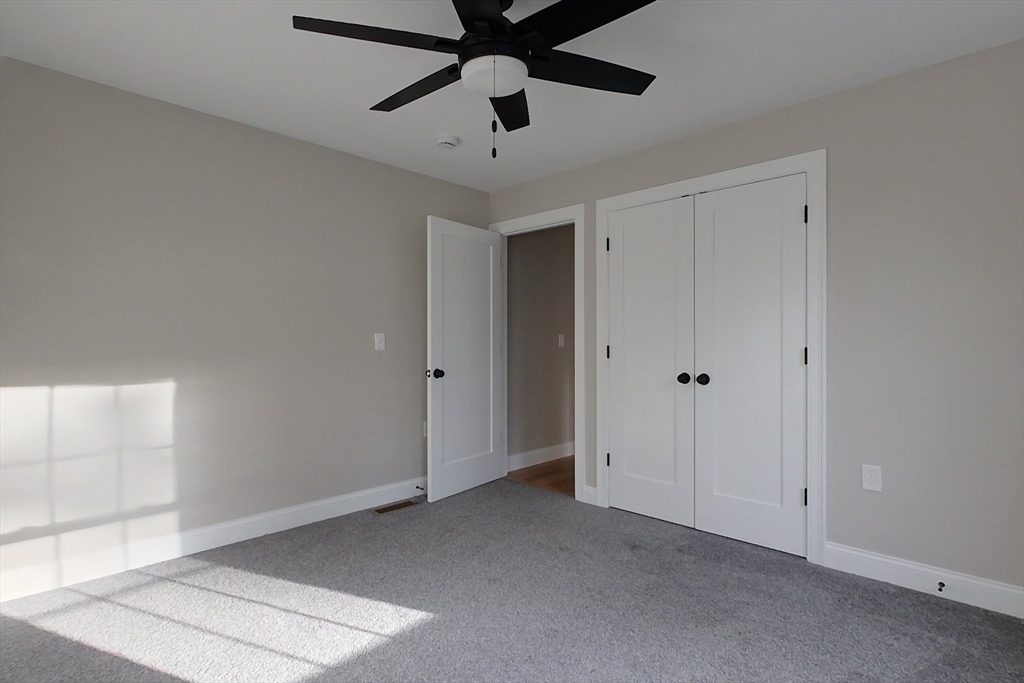 129 Lowell Road Pepperell, MA 01463 - Photo 27 of 39 a view of an empty room