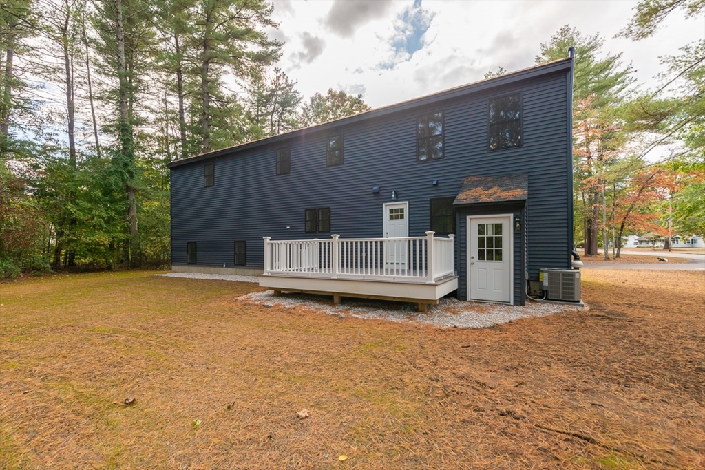 129 Lowell Road Pepperell, MA 01463 - Photo 33 of 39 a view of house with outdoor space and porch