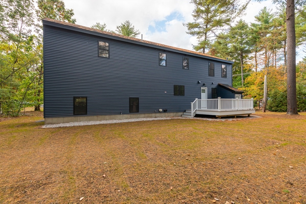 129 Lowell Road Pepperell, MA 01463 - Photo 34 of 39 a front view of house with an outdoor space