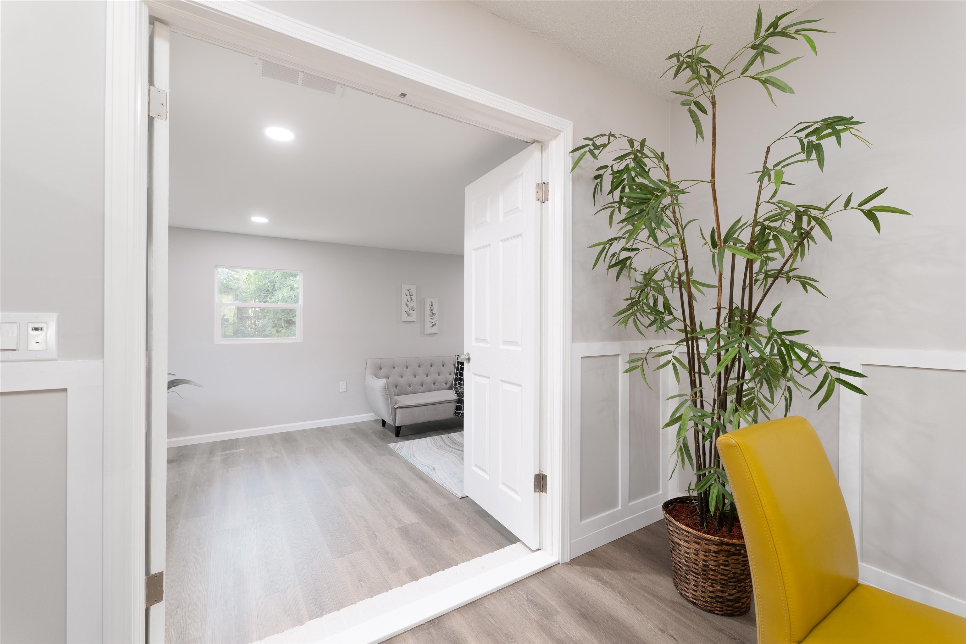 313 Cypress Road St. Augustine, FL 32086 - Photo 12 of 27 a view of a room with furniture and a potted plant