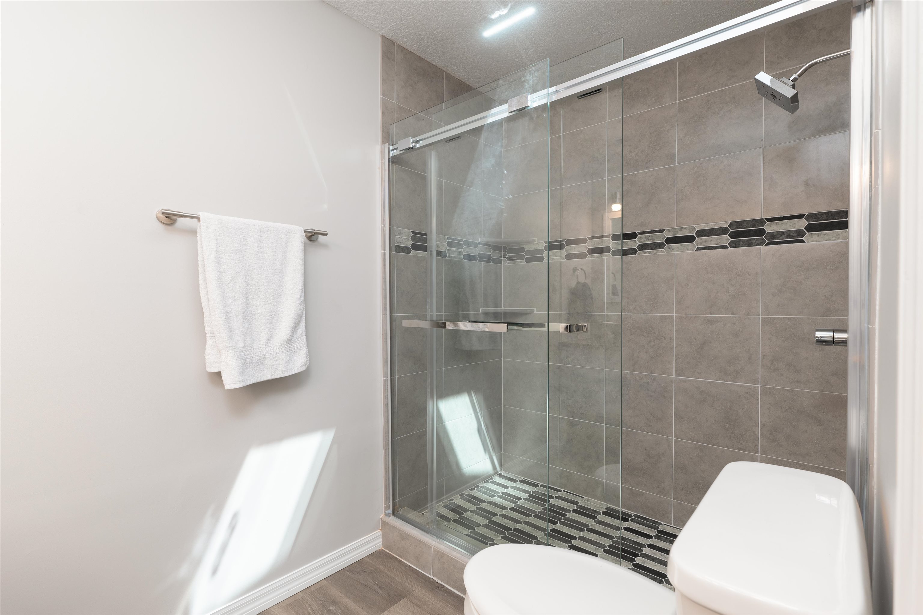 313 Cypress Road St. Augustine, FL 32086 - Photo 18 of 27 a bathroom with a shower toilet and sink