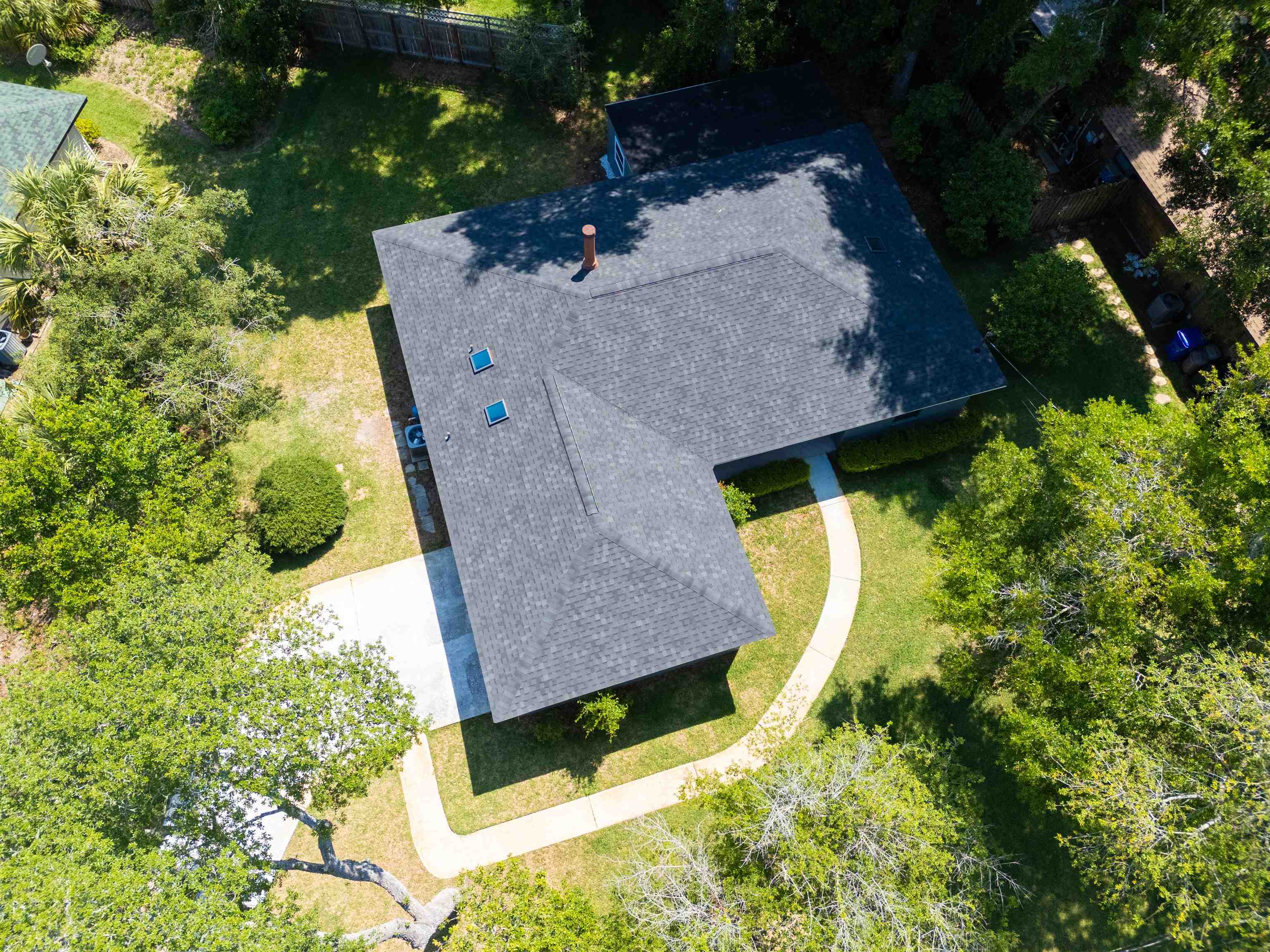 313 Cypress Road St. Augustine, FL 32086 - Photo 27 of 27 an aerial view of a house with a yard and large trees