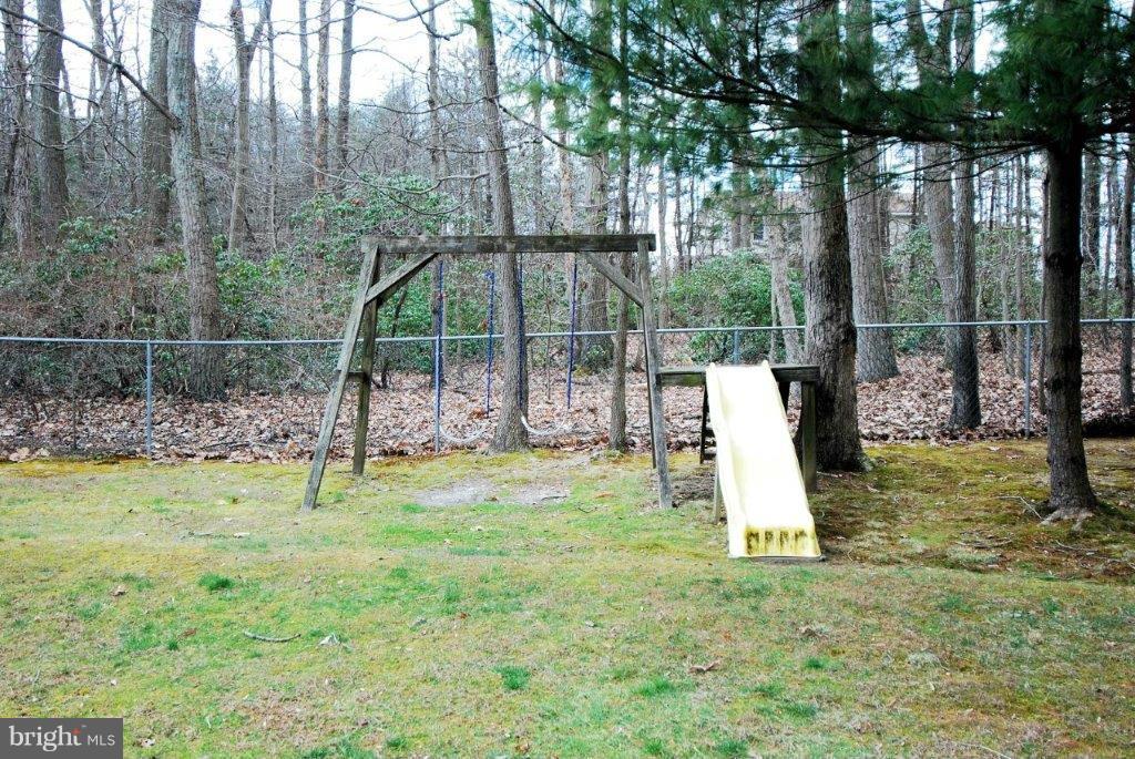 1007 Shady Beach Road Elkton, MD 21921 - Photo 27 of 30 Fenced Backyard Surrounded By Trees