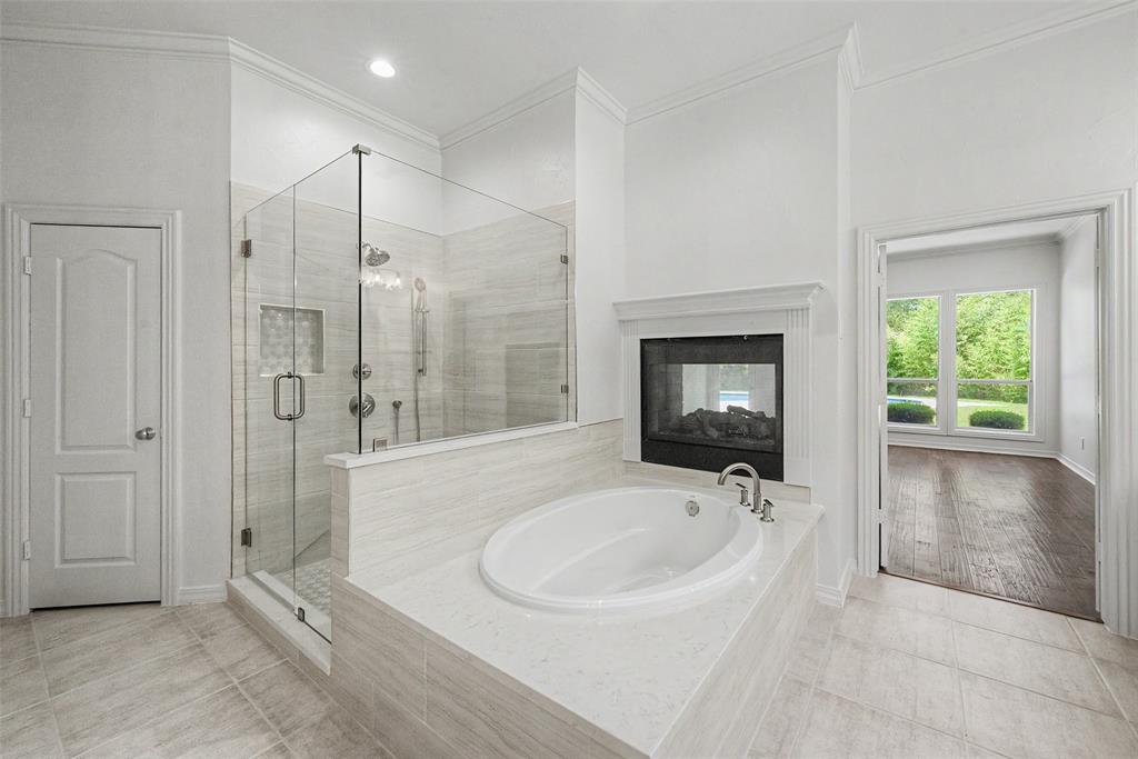 1200 Mount Gilead Road Keller, TX 76262 - Photo 24 of 38 a bathroom with a bathtub and a sink
