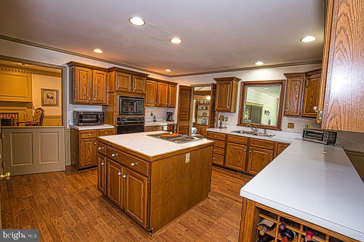 623 Douglas Road Salisbury, MD 21801 - Photo 17 of 64 Kitchen in center of house behind stairs
