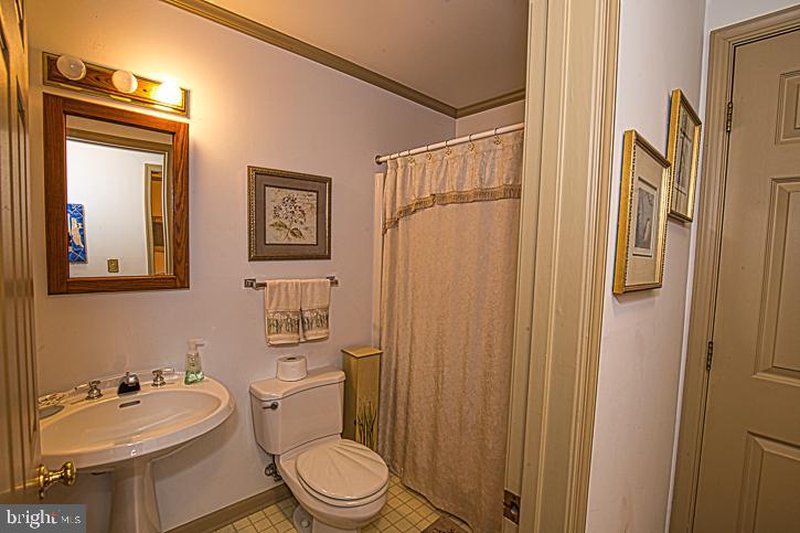 623 Douglas Road Salisbury, MD 21801 - Photo 28 of 64 Downstairs bath in sep hallway off kit table area