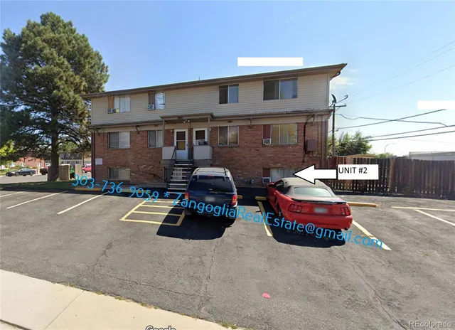 a car parked in front of a building