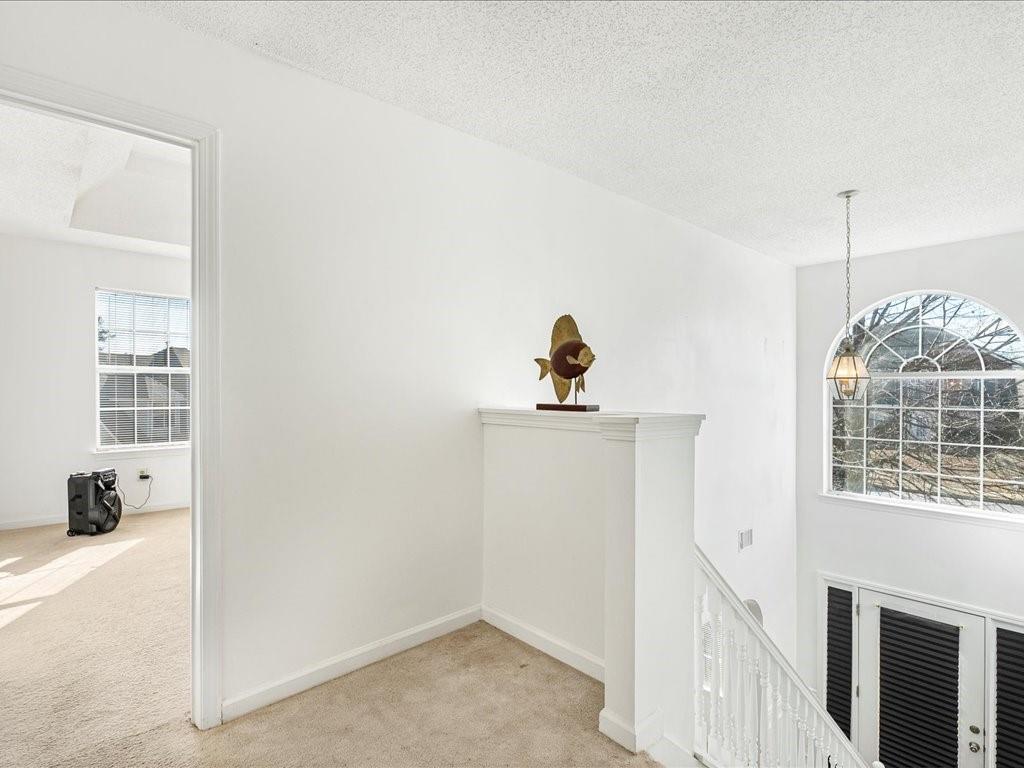 11950 Markham Way Hampton, GA 30228 - Photo 14 of 32 a view of storage and utility room with wooden floor
