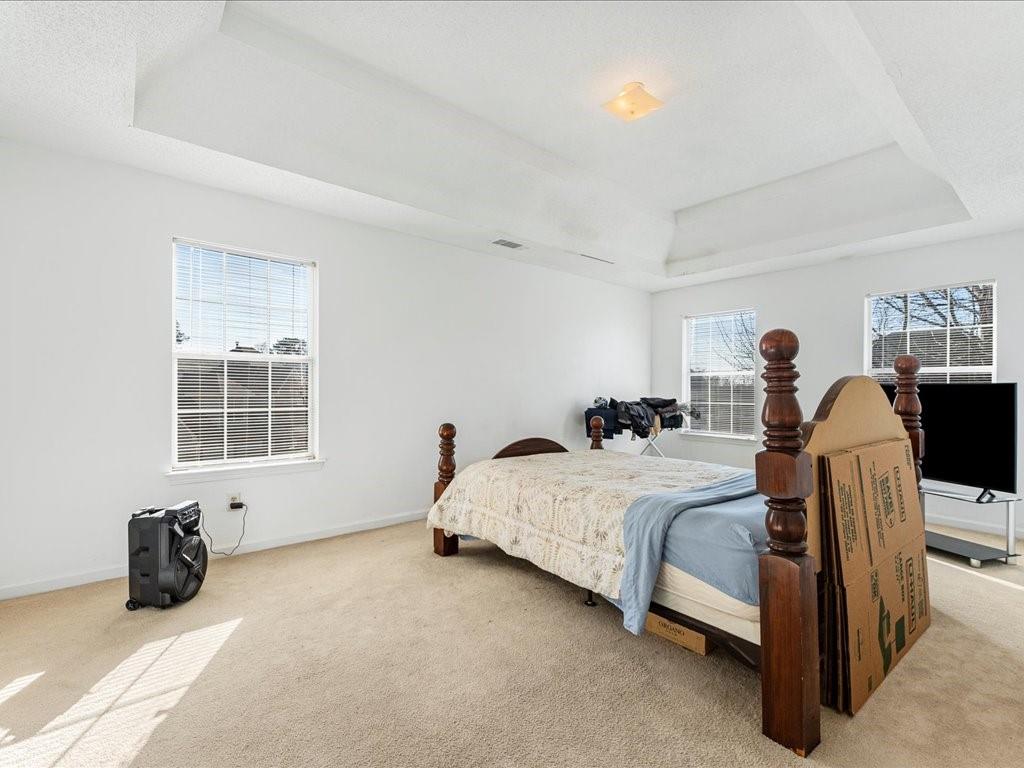 11950 Markham Way Hampton, GA 30228 - Photo 15 of 32 a bedroom with bed and a window