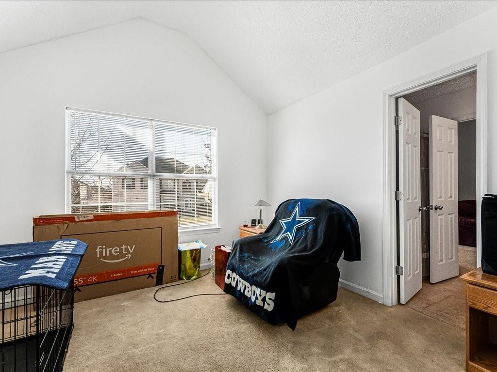 11950 Markham Way Hampton, GA 30228 - Photo 22 of 32 a living room with a dresser and a window