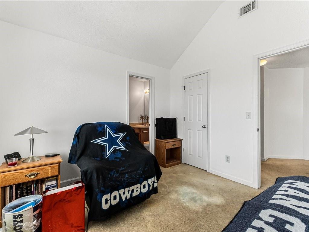 11950 Markham Way Hampton, GA 30228 - Photo 23 of 32 a bedroom with furniture and a window