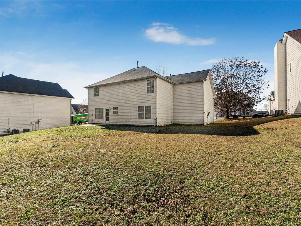 11950 Markham Way Hampton, GA 30228 - Photo 27 of 32 a view of a house with a yard