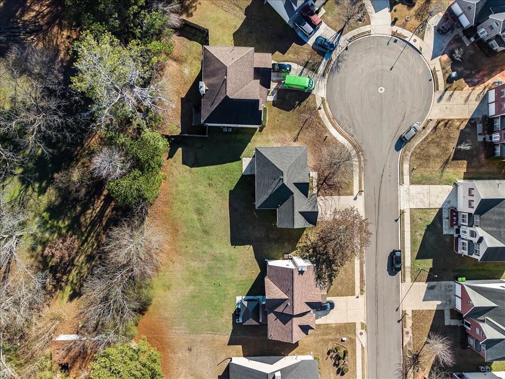 11950 Markham Way Hampton, GA 30228 - Photo 29 of 32 an aerial view of residential houses with outdoor space