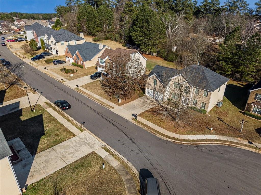 11950 Markham Way Hampton, GA 30228 - Photo 30 of 32 an aerial view of a house with a yard