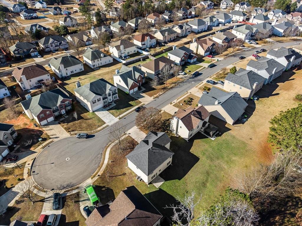 11950 Markham Way Hampton, GA 30228 - Photo 32 of 32 an aerial view of a house with a swimming pool