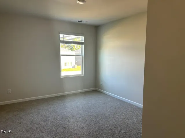 an empty room with window