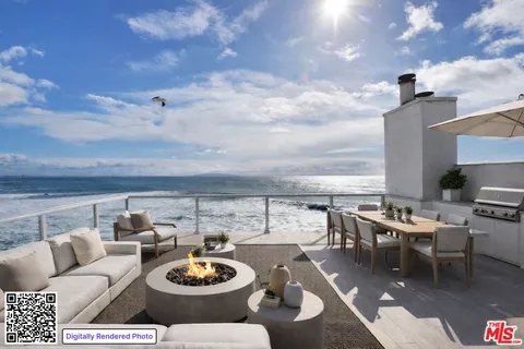 a view of a terrace with furniture and stove