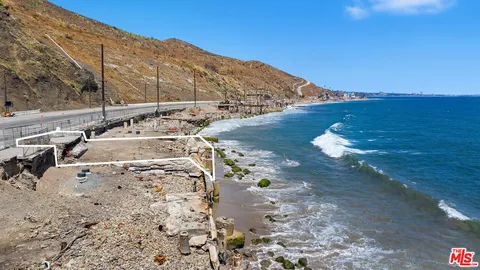 a view of a balcony with a ocean view