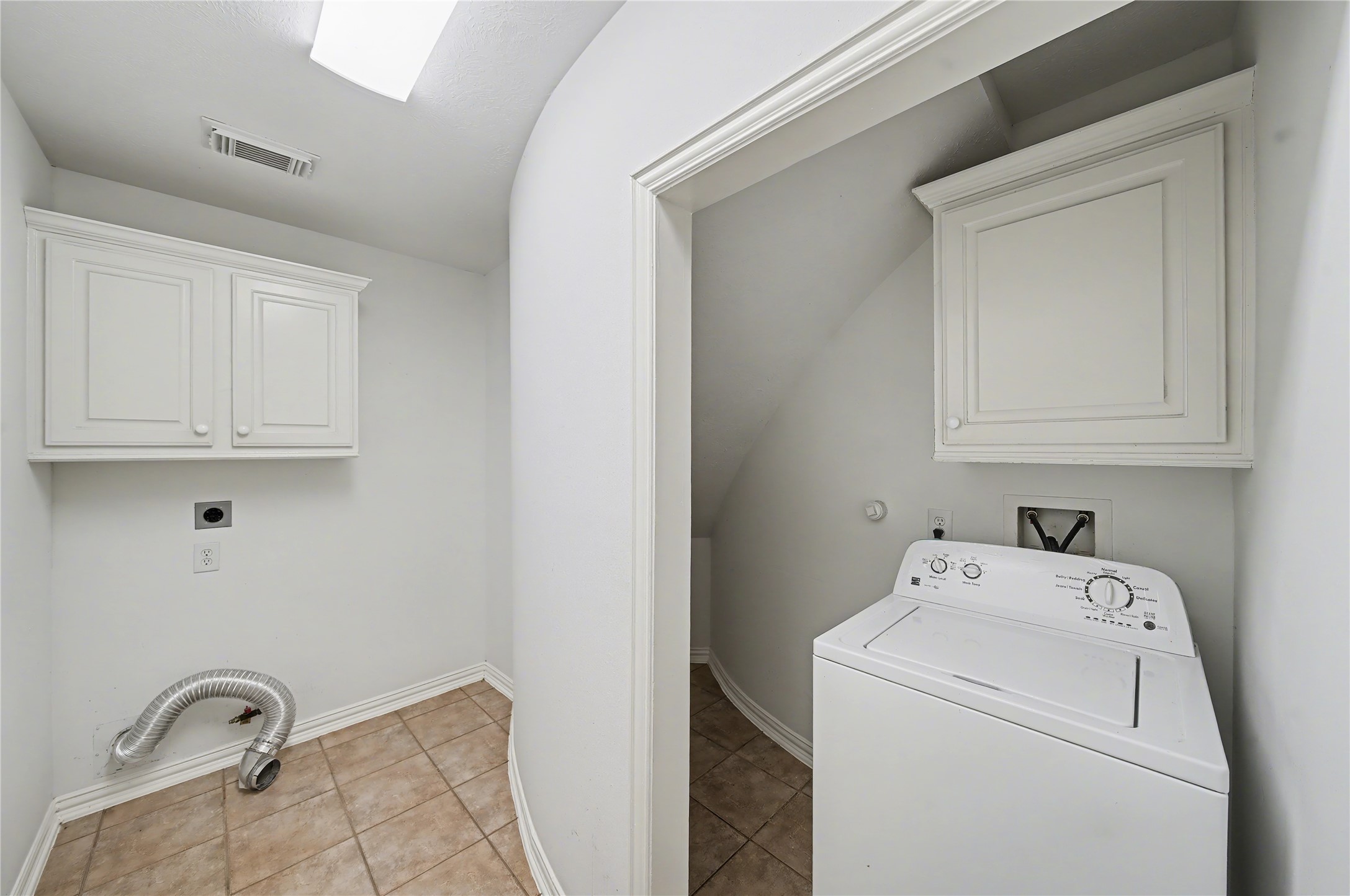 5403 Emerald Pointe Lane Sugar Land, TX 77479 - Photo 22 of 50 a view of storage and utility room with washer and dryer