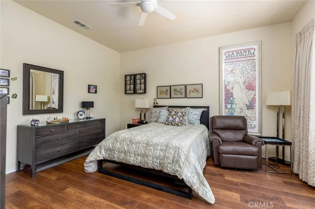 a bedroom with a bed and furniture